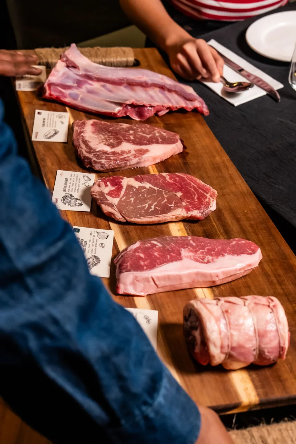The Brick by Justwine: the dining room and meat selection. Photographs supplied with the restaurant brief.