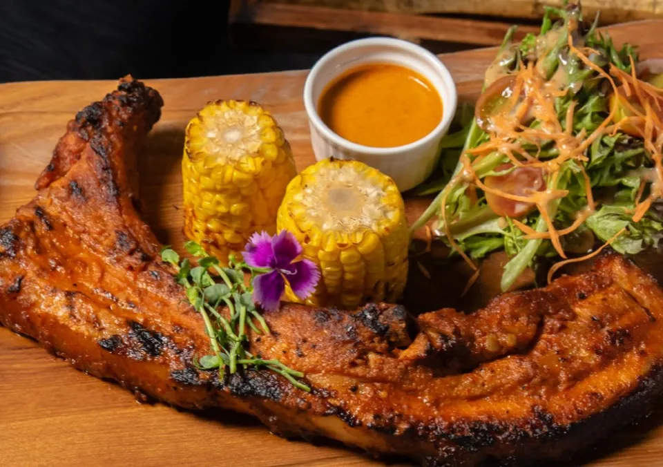 Coal TTDI: the dining room and Peri Peri King Rib. Photographs supplied with the restaurant brief.
