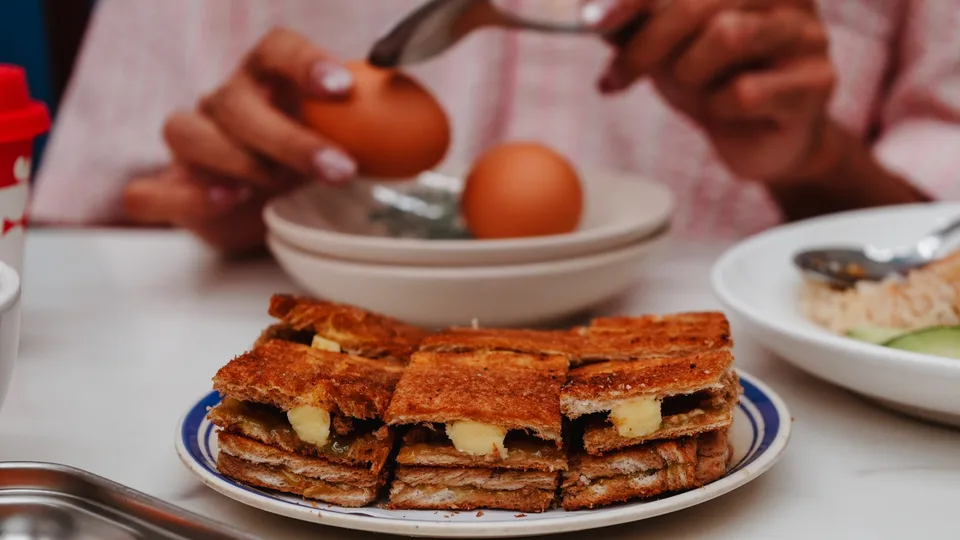 Roti bakar and a cup of Claybrew Kopi make a familiar start to the meal. Photography supplied.