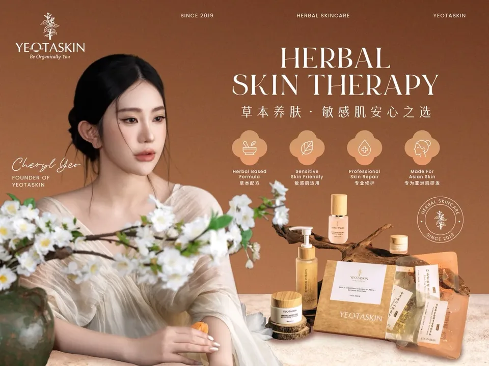 Yeotaskin campaign featuring founder Cheryl Yeo, white blossoms and the brand’s herbal skincare products on a warm brown background.