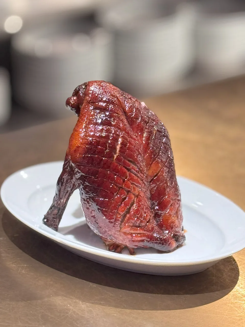 Coal Bukit Bintang: the chef’s counter and dry-aged duck. Photographs supplied with the restaurant brief.